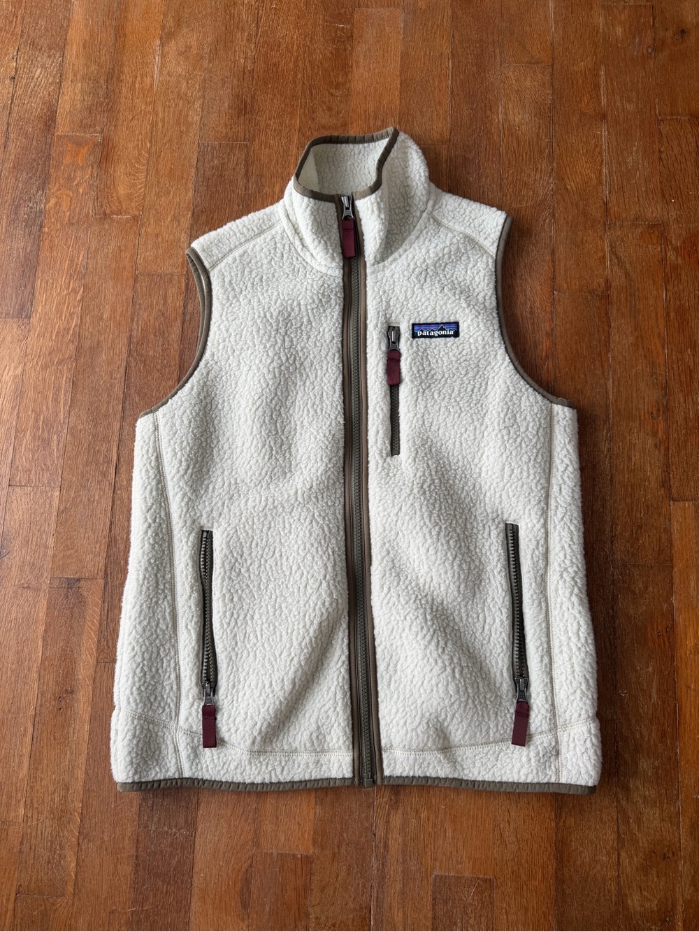 Patagonia Cream Sherpa Fleece Vest with Brown Trim and Maroon Zipper Pulls